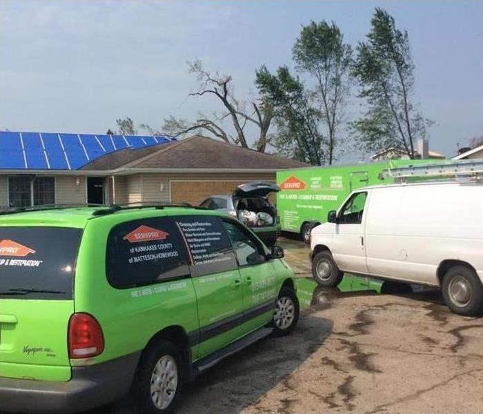 Our van outside a flood damage restoration job