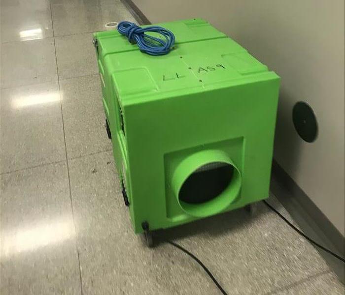 Green Air Scrubber in a hall